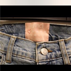 Super cute revice skinny jeans. Star pattern on the back.